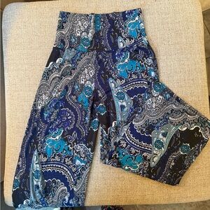 Harem style flowy pants with designs. Buttery soft and very stretchy.